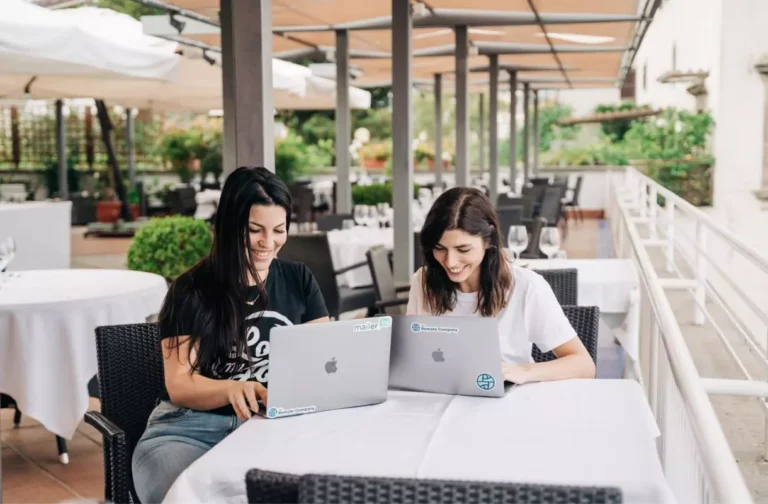MailerLite's remote team working at a restaurant.