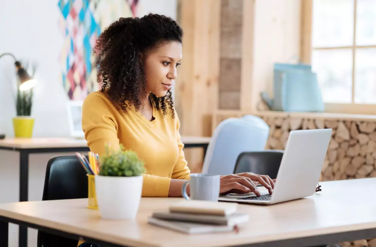 Productive blogger working on a laptop