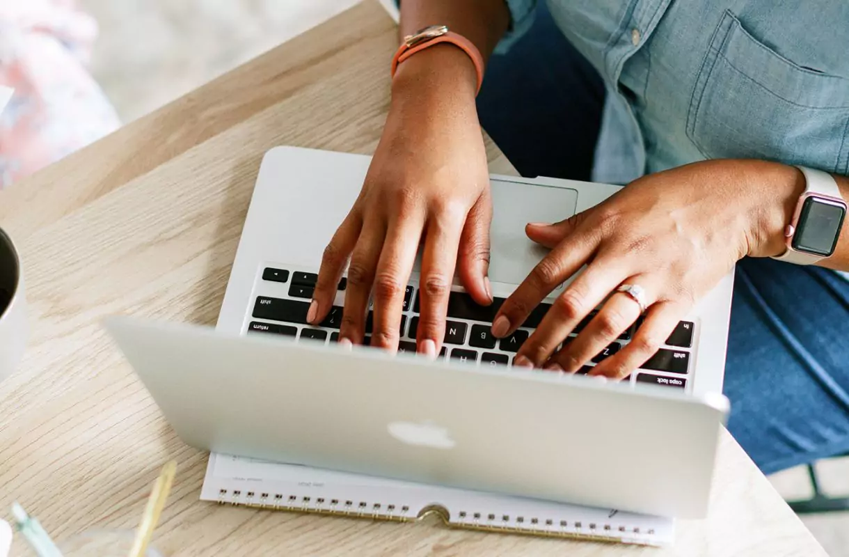 WordPress Discussion Settings - woman working on a laptop